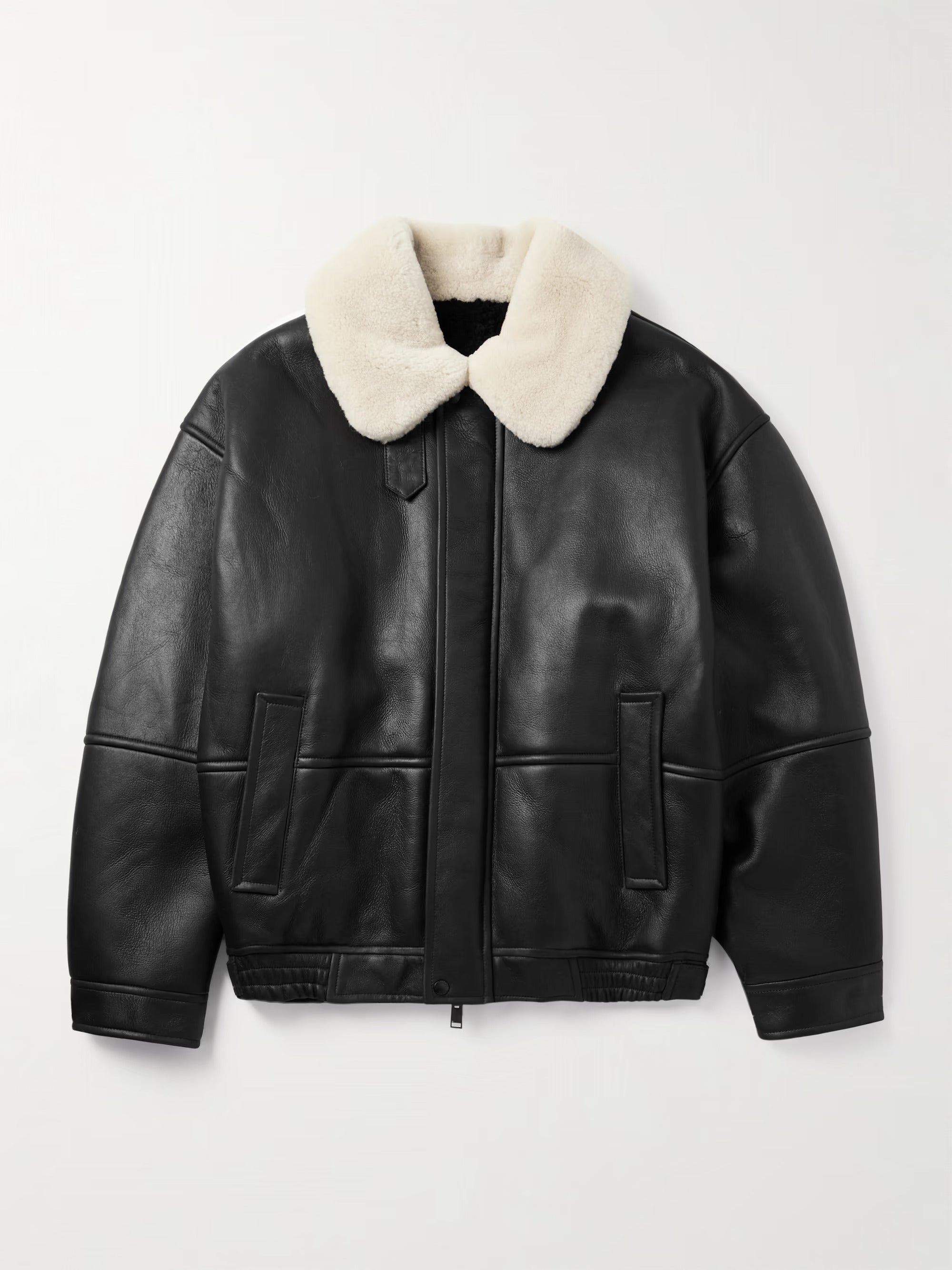 Black leather jacket with white shearling collar on a light gray background